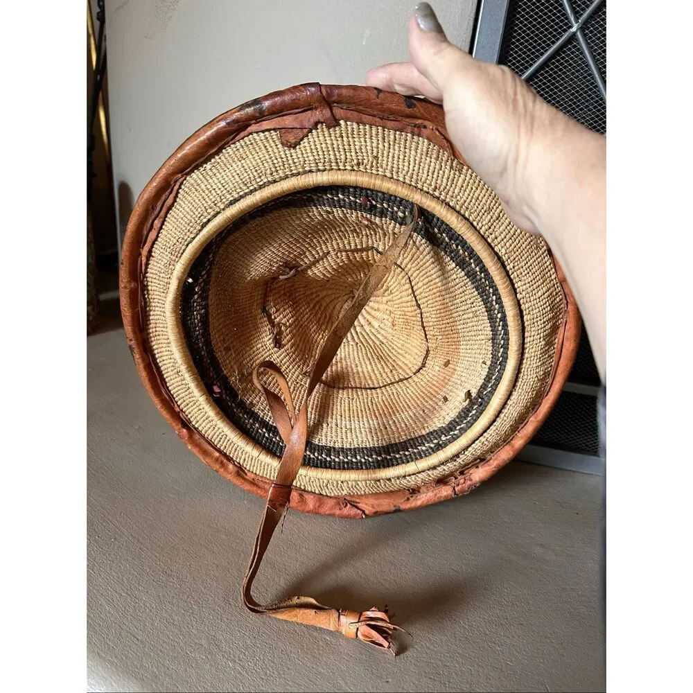 Vintage handwoven basketry hat with leather trim. Tribal/Boho decor